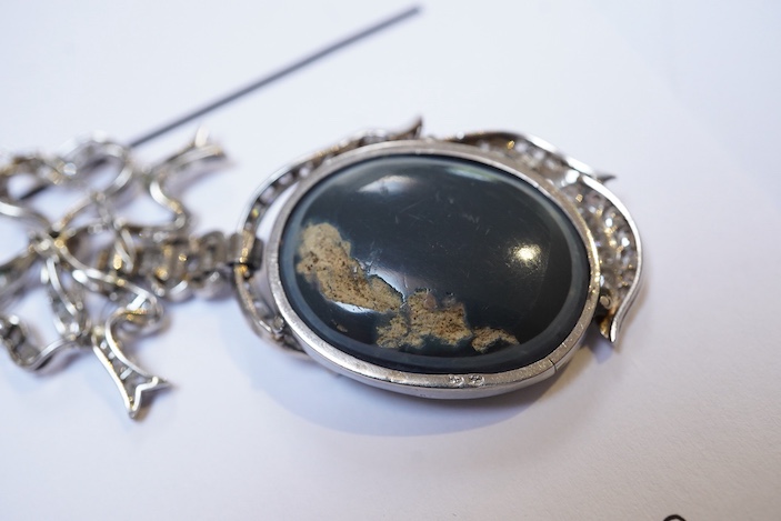 An impressive Belle Epoque black opal and diamond pendant, early 20th century